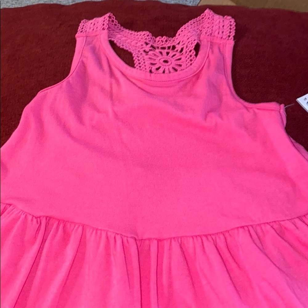 A tiered croch‎ in hot pink